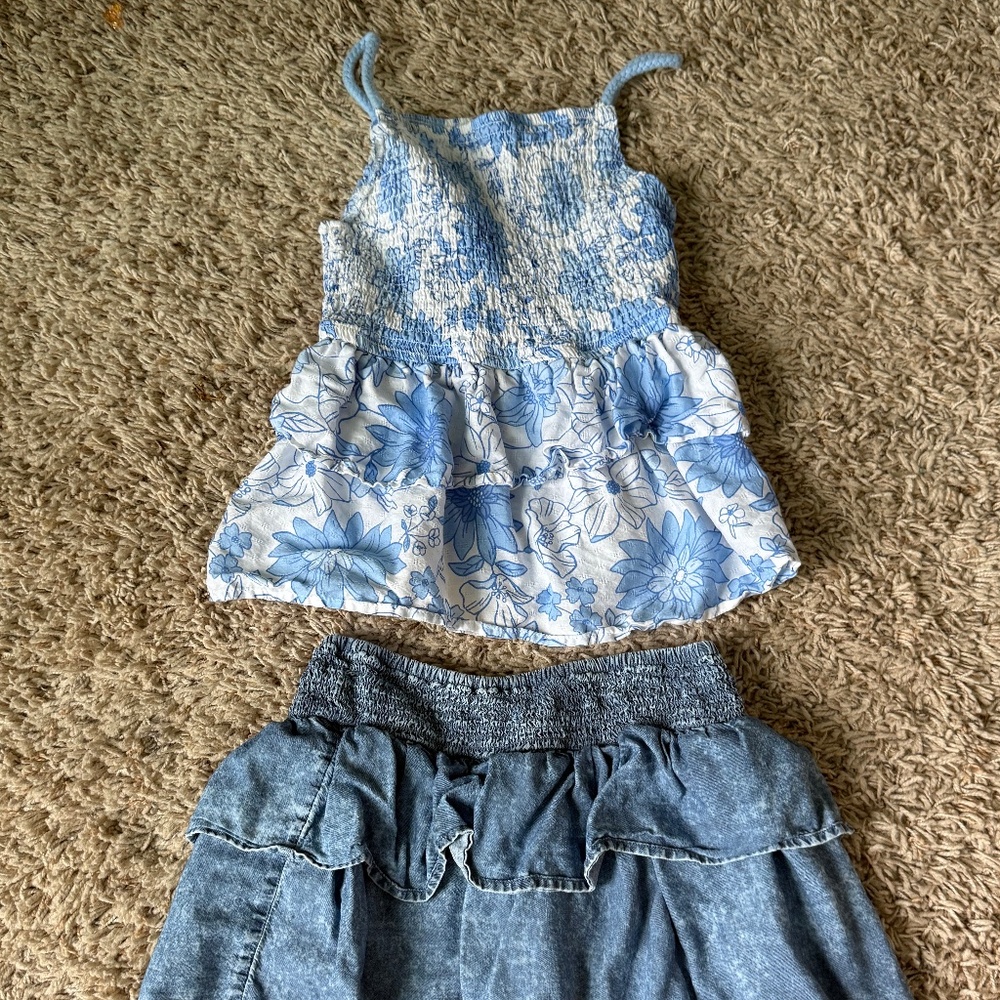 A ruffle shirt and a ruffle skort